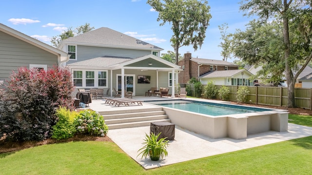1607 Waterside Blvd, Moncks Corner, SC 29461 - back of property featuring a patio area and a shingled roof