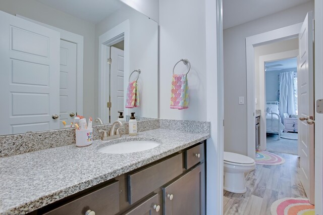1607 Waterside Blvd, Moncks Corner, SC 29461 - ensuite bathroom with vanity, toilet, and wood finished floors