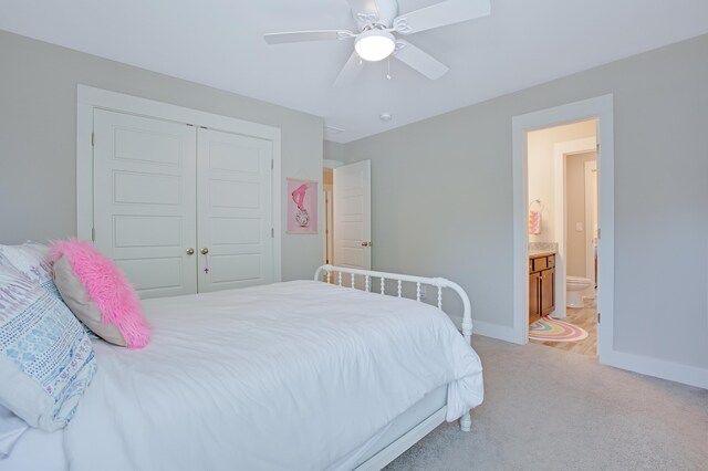 1607 Waterside Blvd, Moncks Corner, SC 29461 - bedroom featuring baseboards, light carpet, a closet, a ceiling fan, and ensuite bath