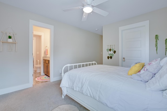 1607 Waterside Blvd, Moncks Corner, SC 29461 - bedroom featuring baseboards, light carpet, ensuite bathroom, and a ceiling fan