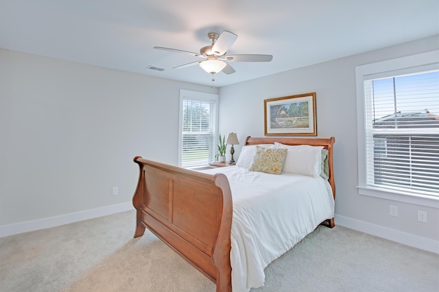 1607 Waterside Blvd, Moncks Corner, SC 29461 - bedroom with light colored carpet, baseboards, and a ceiling fan