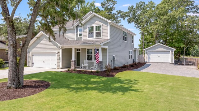 1607 Waterside Blvd, Moncks Corner, SC 29461 - view of front of house featuring covered porch and an outbuilding