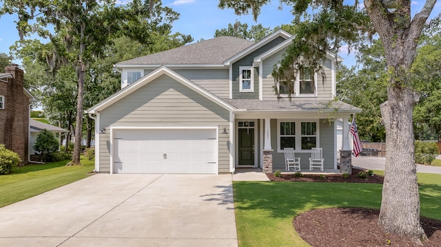 1607 Waterside Blvd, Moncks Corner, SC 29461 - view of front of house featuring covered porch, driveway, a front yard, and roof with shingles