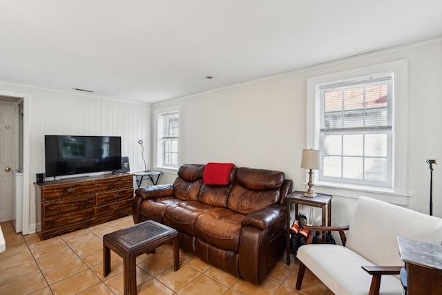 9 F St, Charleston, SC 29403 - living area featuring light tile patterned flooring and ornamental molding
