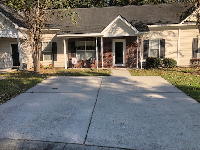 view of front of home featuring covered porch