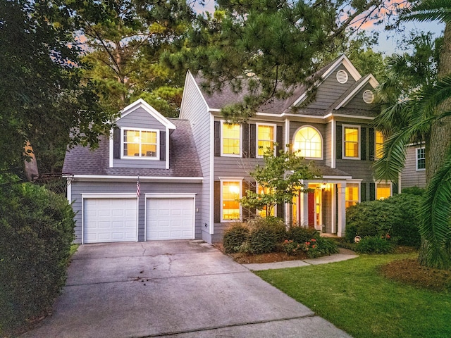 view of front of property with a garage