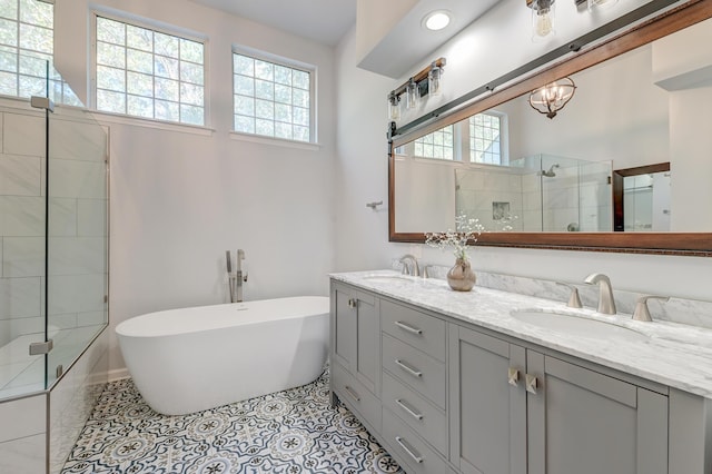 bathroom featuring vanity, tile patterned floors, and independent shower and bath