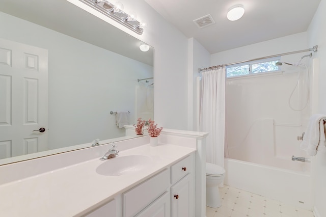 full bathroom with shower / bath combination with curtain, vanity, and toilet