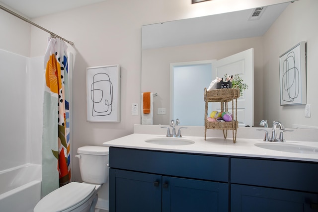 full bathroom featuring shower / bath combination with curtain, vanity, and toilet