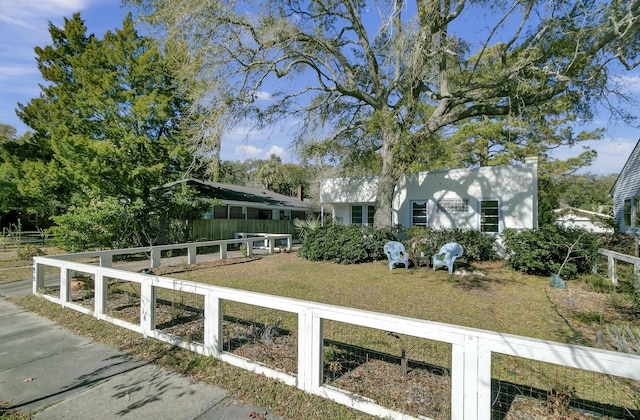 view of home's exterior with a lawn