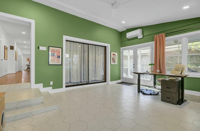 entryway featuring french doors, light tile patterned floors, and an AC wall unit