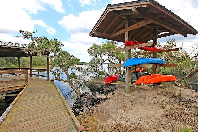 dock area with a water view