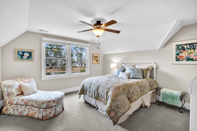 bedroom featuring visible vents, baseboards, lofted ceiling, ceiling fan, and carpet floors