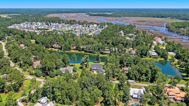 birds eye view of property with a water view and a residential view