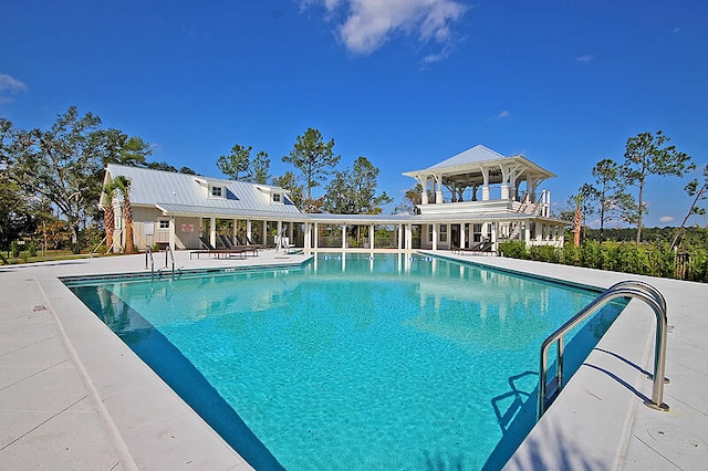 pool with a patio area