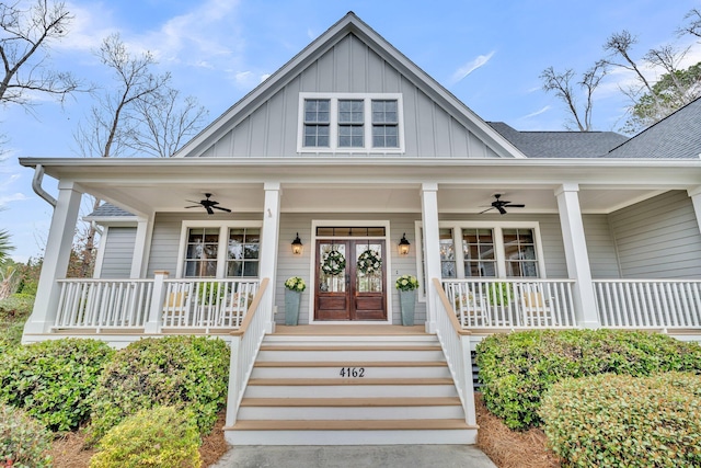 view of front of home featuring covered porch, ceiling fan, french doors, and board and batten siding