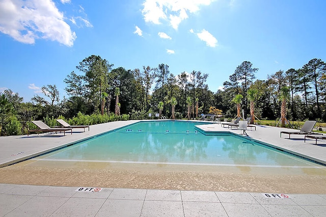 community pool featuring a patio