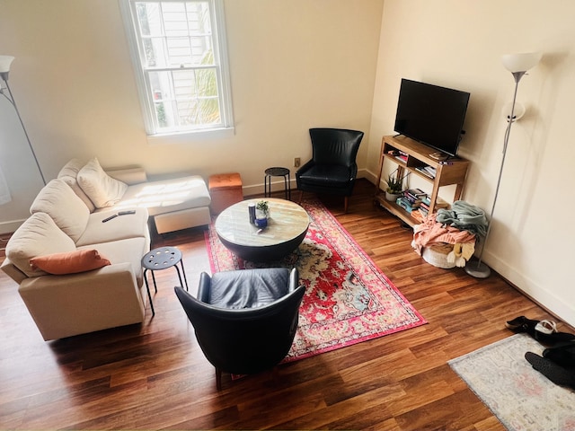 living room featuring dark hardwood / wood-style floors