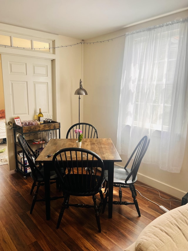 dining room featuring dark hardwood / wood-style floors