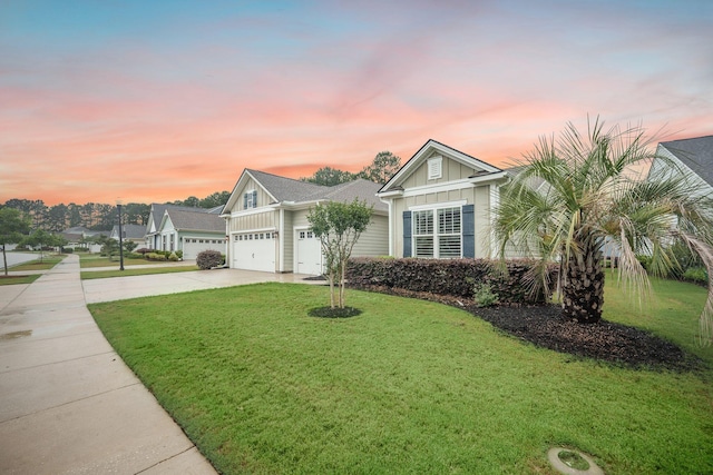 331 Fish Creek Ct, Summerville, SC 29486 - view of front facade with board and batten siding, driveway, a front yard, and an attached garage