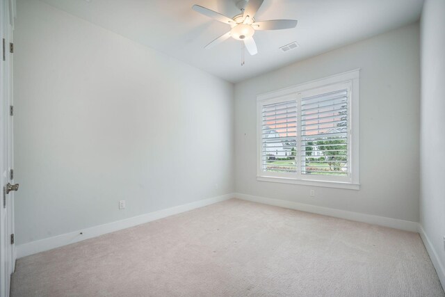 331 Fish Creek Ct, Summerville, SC 29486 - spare room featuring light carpet, baseboards, and ceiling fan