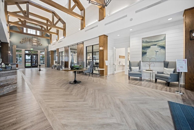 331 Fish Creek Ct, Summerville, SC 29486 - lobby featuring a towering ceiling and wood walls