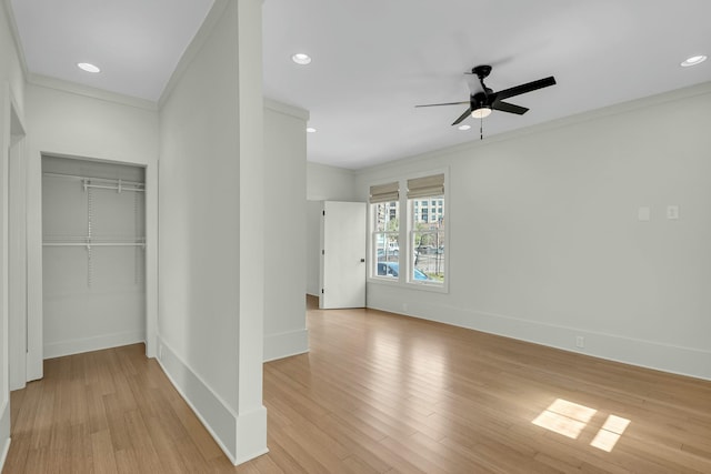 unfurnished bedroom featuring recessed lighting, baseboards, light wood finished floors, and ornamental molding