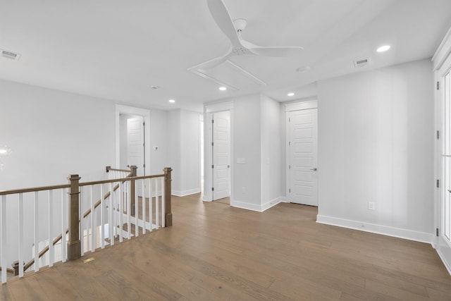 unfurnished room featuring hardwood / wood-style floors