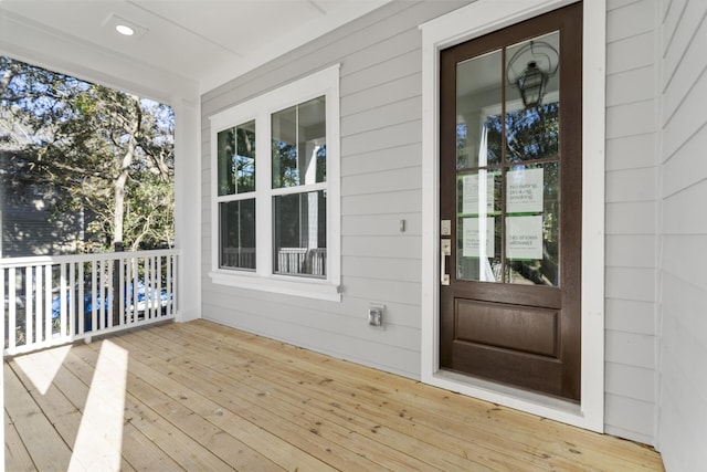 doorway to property with a porch