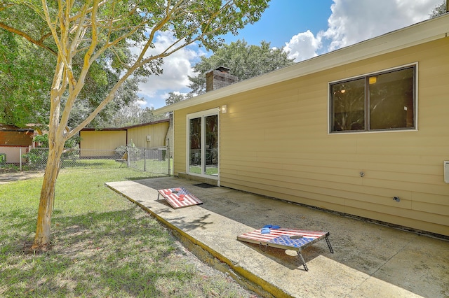 rear view of house with a yard