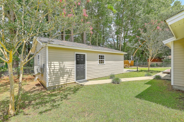 view of outdoor structure featuring a yard