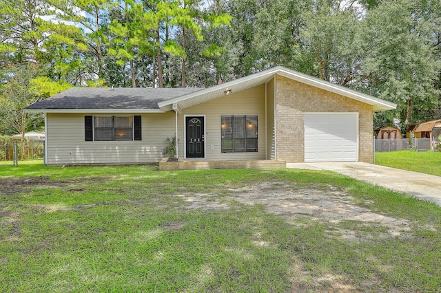 ranch-style home featuring a garage and a front lawn