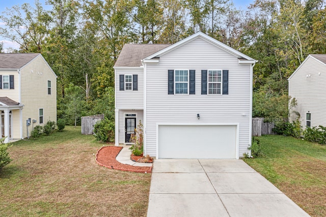 view of front facade with a garage and a front yard