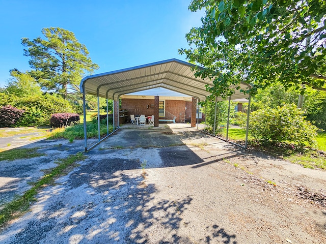 view of parking featuring a carport