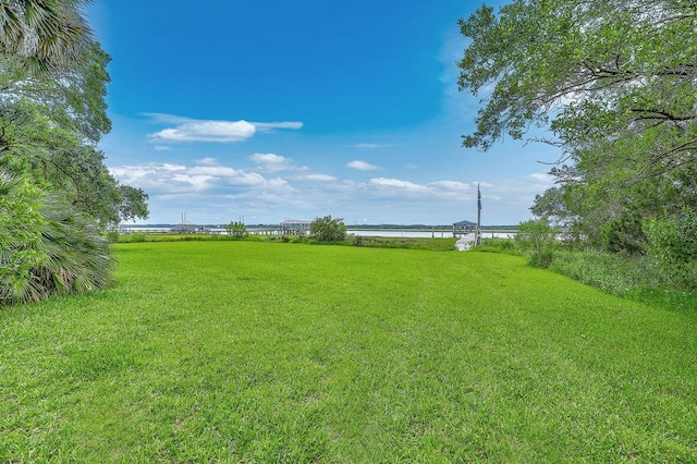 2287 Shoreline Dr, Johns Island, SC 29455 - view of green lawn featuring a water view
