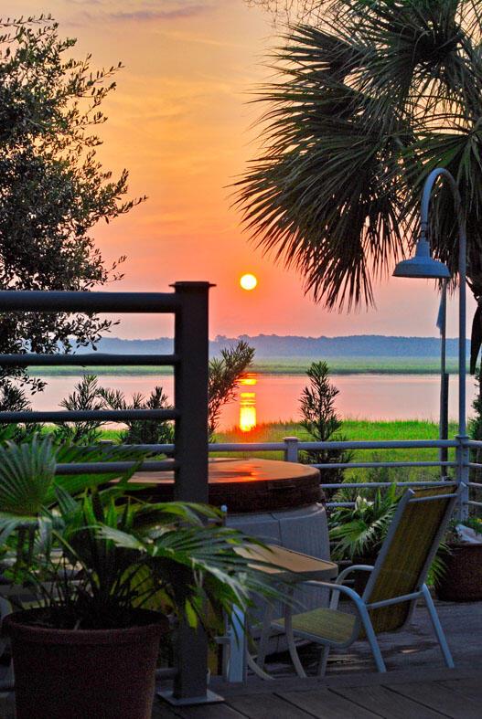 2287 Shoreline Dr, Johns Island, SC 29455 - balcony at dusk featuring a water view