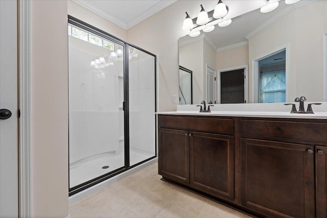 bathroom featuring vanity, crown molding, and an enclosed shower