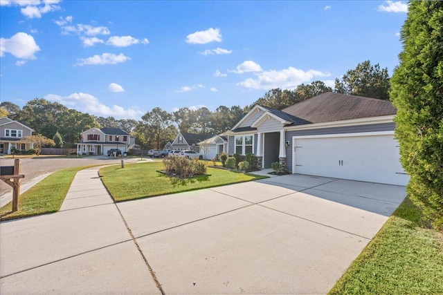 view of front facade with a garage and a front lawn