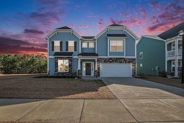 view of front of property with a garage