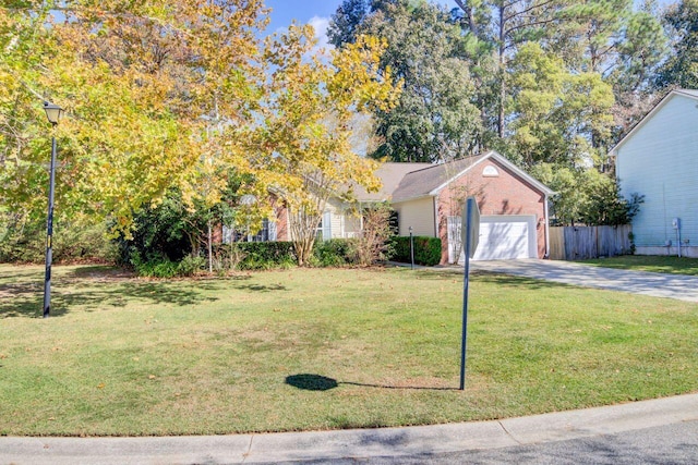 view of front facade with a front lawn and a garage