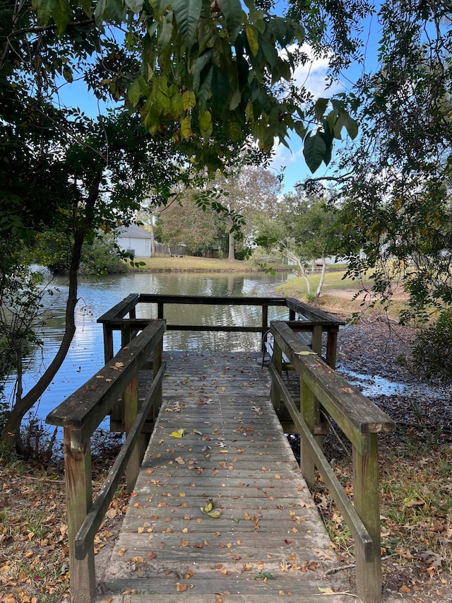 view of dock with a water view