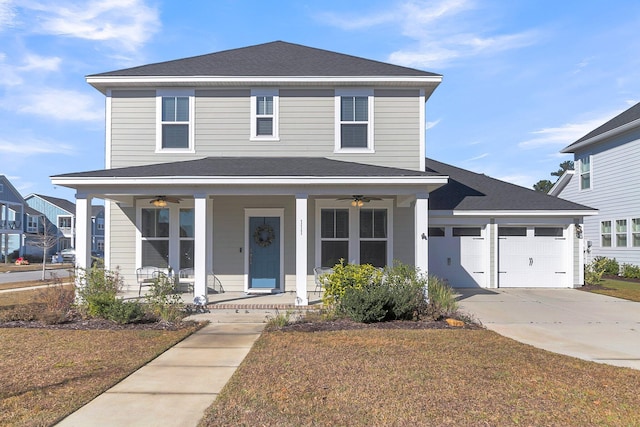 view of front of house with covered porch, a garage, ceiling fan, and a front yard