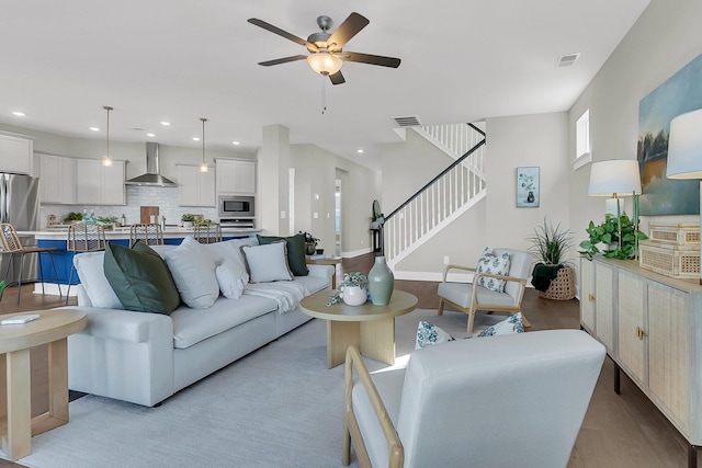 living room with ceiling fan