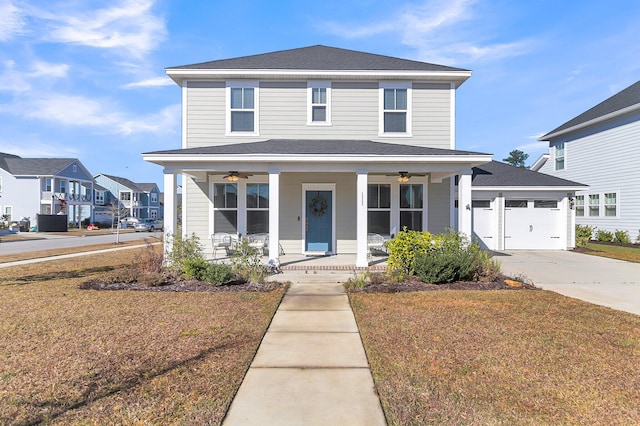 view of property featuring covered porch and a front yard