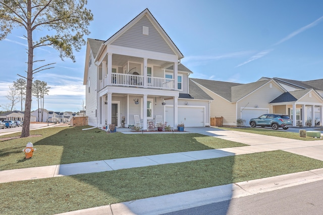 view of front of house featuring a porch, a balcony, and a front yard