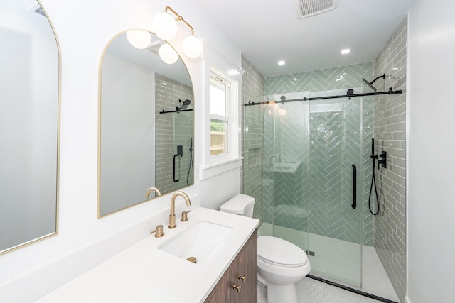 2219 Eagle Dr, North Charleston, SC 29406 - bathroom with vanity, toilet, recessed lighting, visible vents, and a stall shower