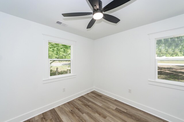 2219 Eagle Dr, North Charleston, SC 29406 - spare room with a ceiling fan, baseboards, visible vents, and wood finished floors