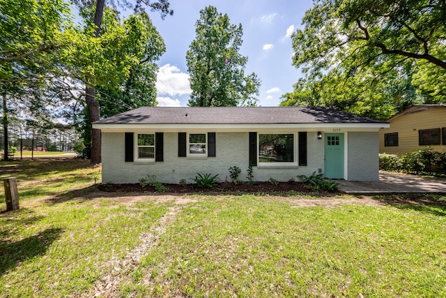 2219 Eagle Dr, North Charleston, SC 29406 - ranch-style home with brick siding and a front lawn