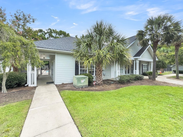 2494 Etiwan Ave Unit 9-D, Charleston, SC 29414 - view of front of house featuring a front yard and roof with shingles
