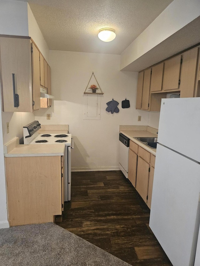 2494 Etiwan Ave Unit 9-D, Charleston, SC 29414 - kitchen featuring white appliances, a textured ceiling, dark wood-type flooring, under cabinet range hood, and light countertops